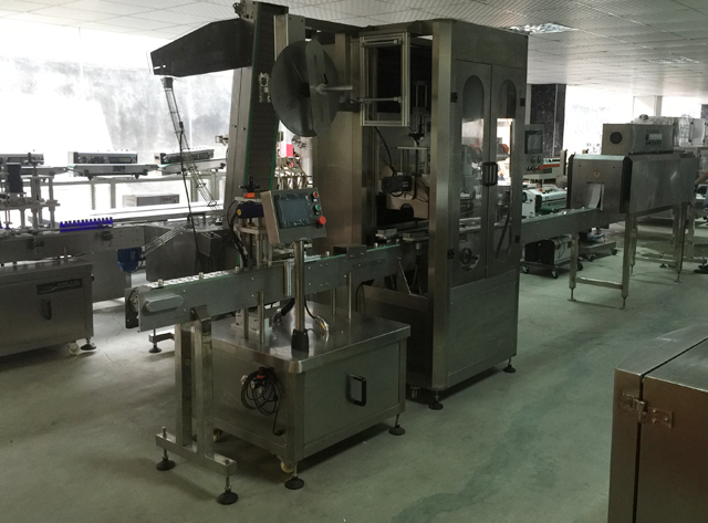 etiquetadora de manga de fita.jpg