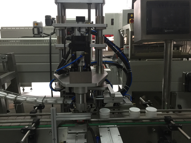 máquina de selar potes.jpg