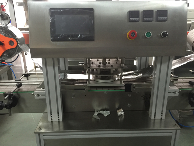 máquina de selar potes.jpg