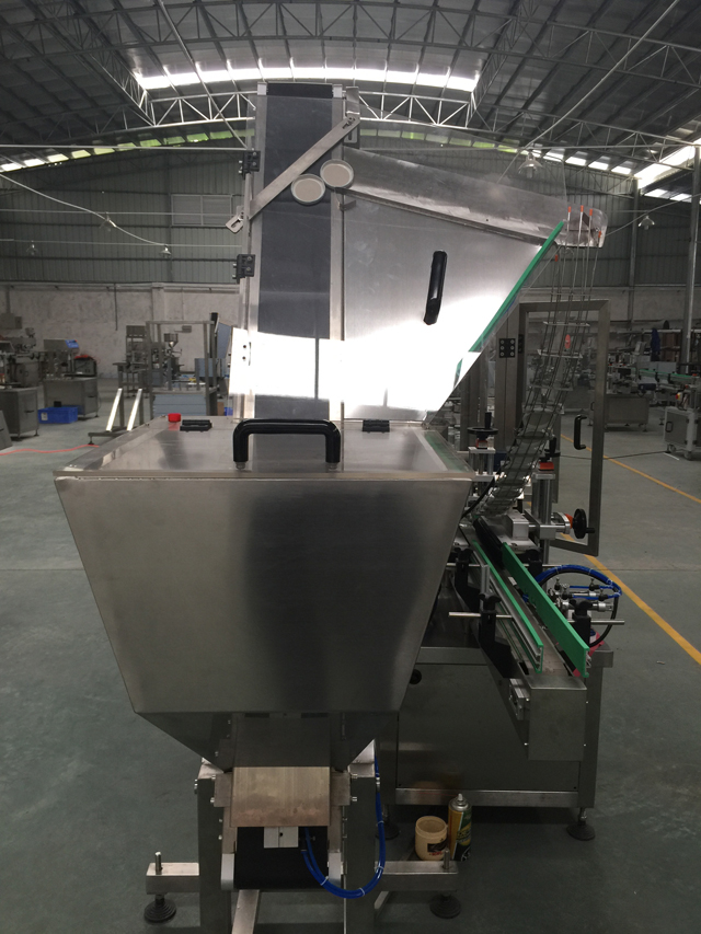 sistema de alimentação automática de tampas.jpg