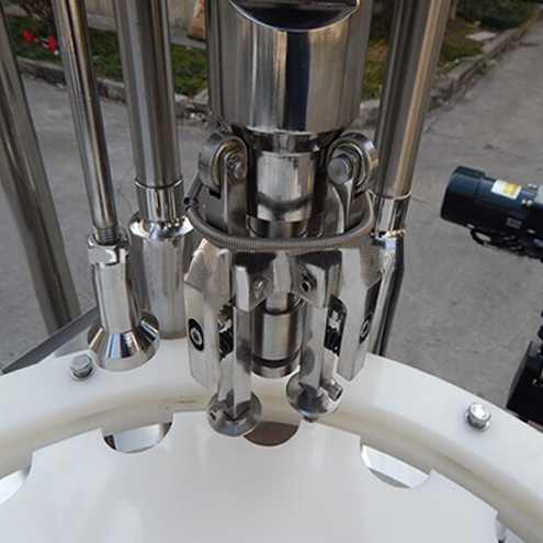 ropp capping heads for vial capper Equipamento de fechamento ROPP para garrafas.jpg