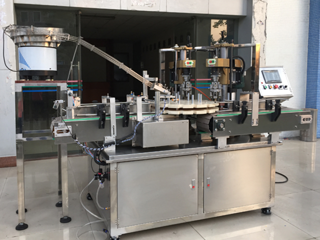 capping machine with 2 capping heads equipamento de tampa de rosca semi automático.jpg