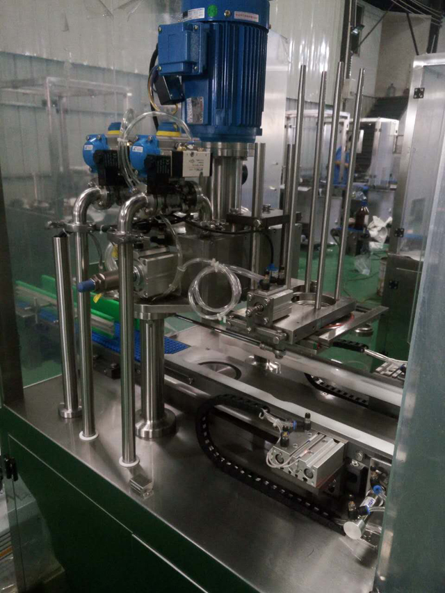 Foto de perto para máquina de costura a vácuo.jpg