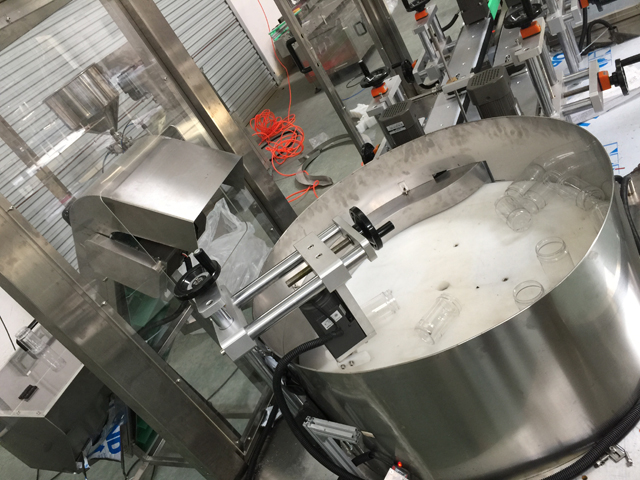 sistema de elevação de desembaraçador de garrafas.jpg