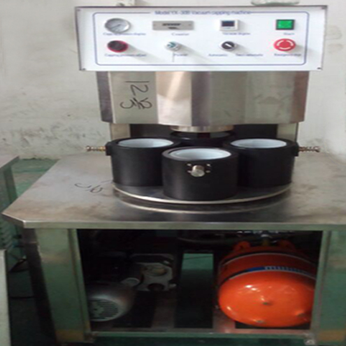 illustration of vacuum capping machine semi automatic ilustração para tampa de vácuo.jpg