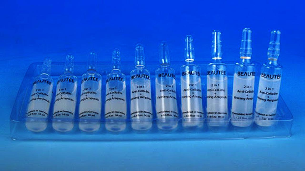 liquid solution bottles labeling machine samples final products frascos de ampola.jpg