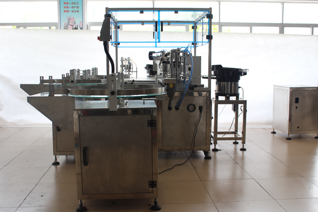 máquina de enchimento e tampa de óleo essencial.jpg